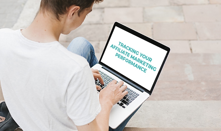 Image of a person looking at a laptop with text "tracking your affiliate marketing performance"